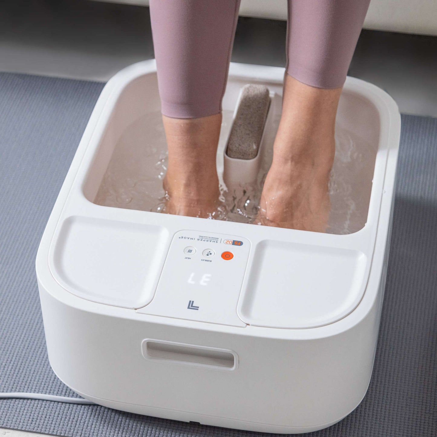Sharper Image fotbad med värme och LCD-display